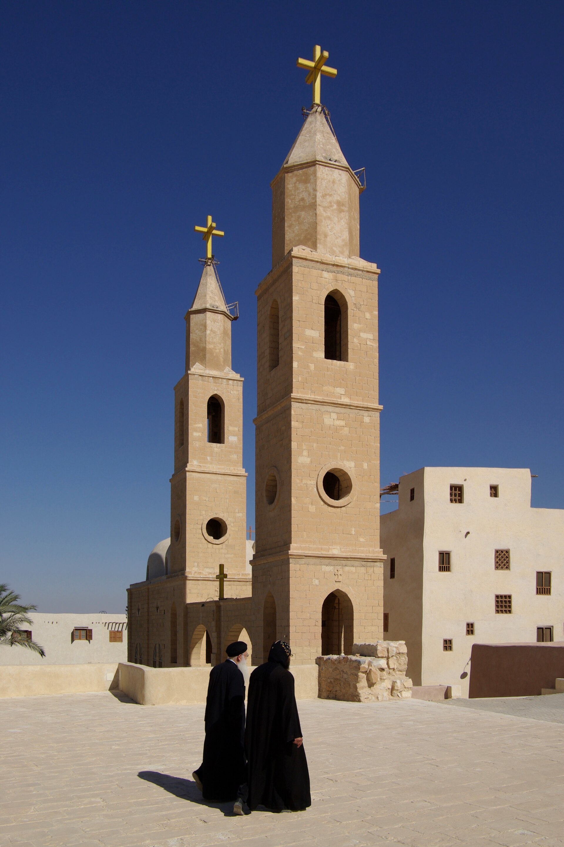 The fortified desert monastery of Saint Anthony beneath barren mountains
